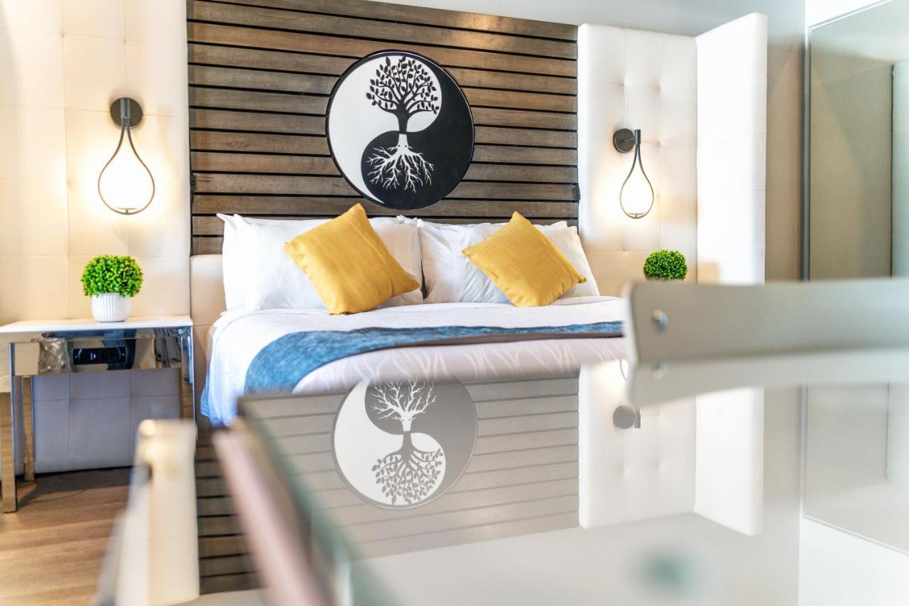 Aspire Inn Studios & Spas Беллфлавер Екстер'єр фото