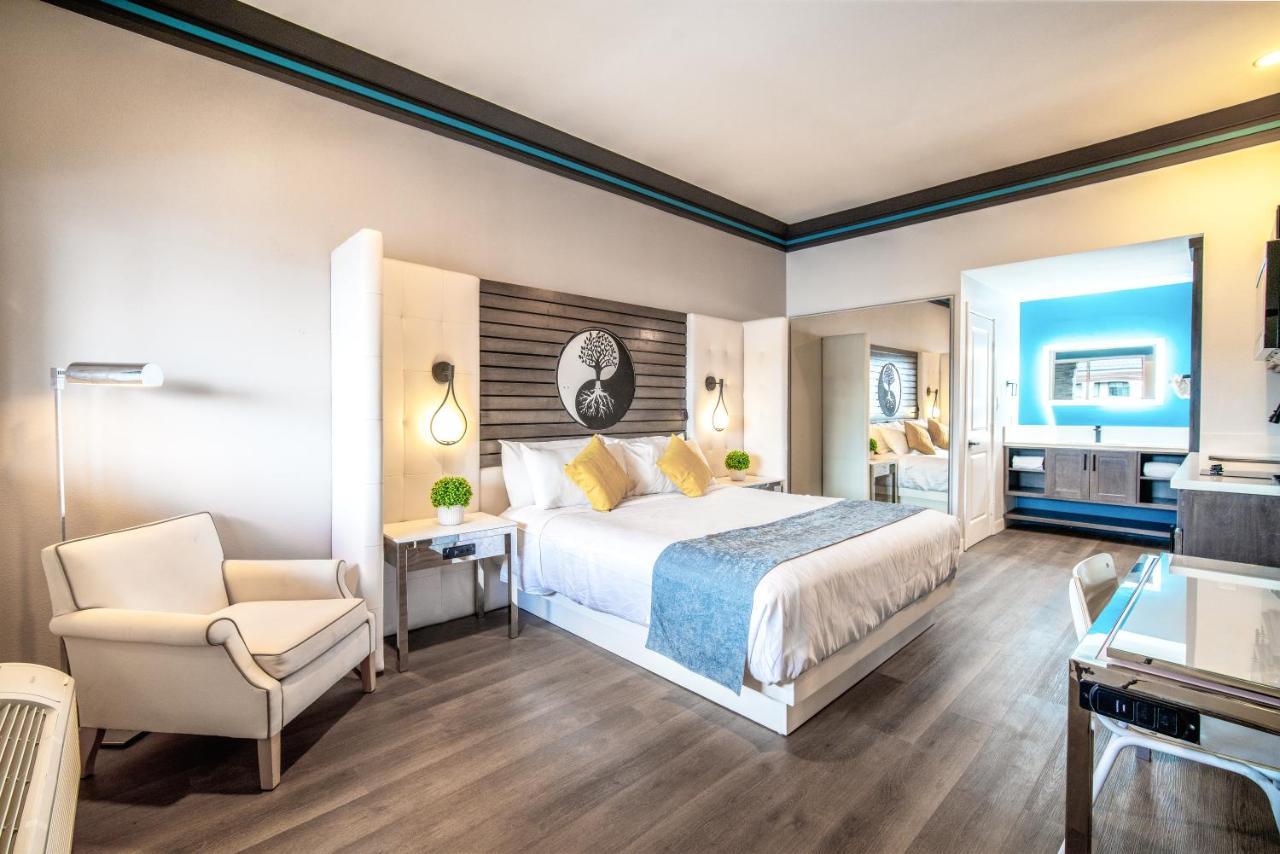 Aspire Inn Studios & Spas Беллфлавер Екстер'єр фото