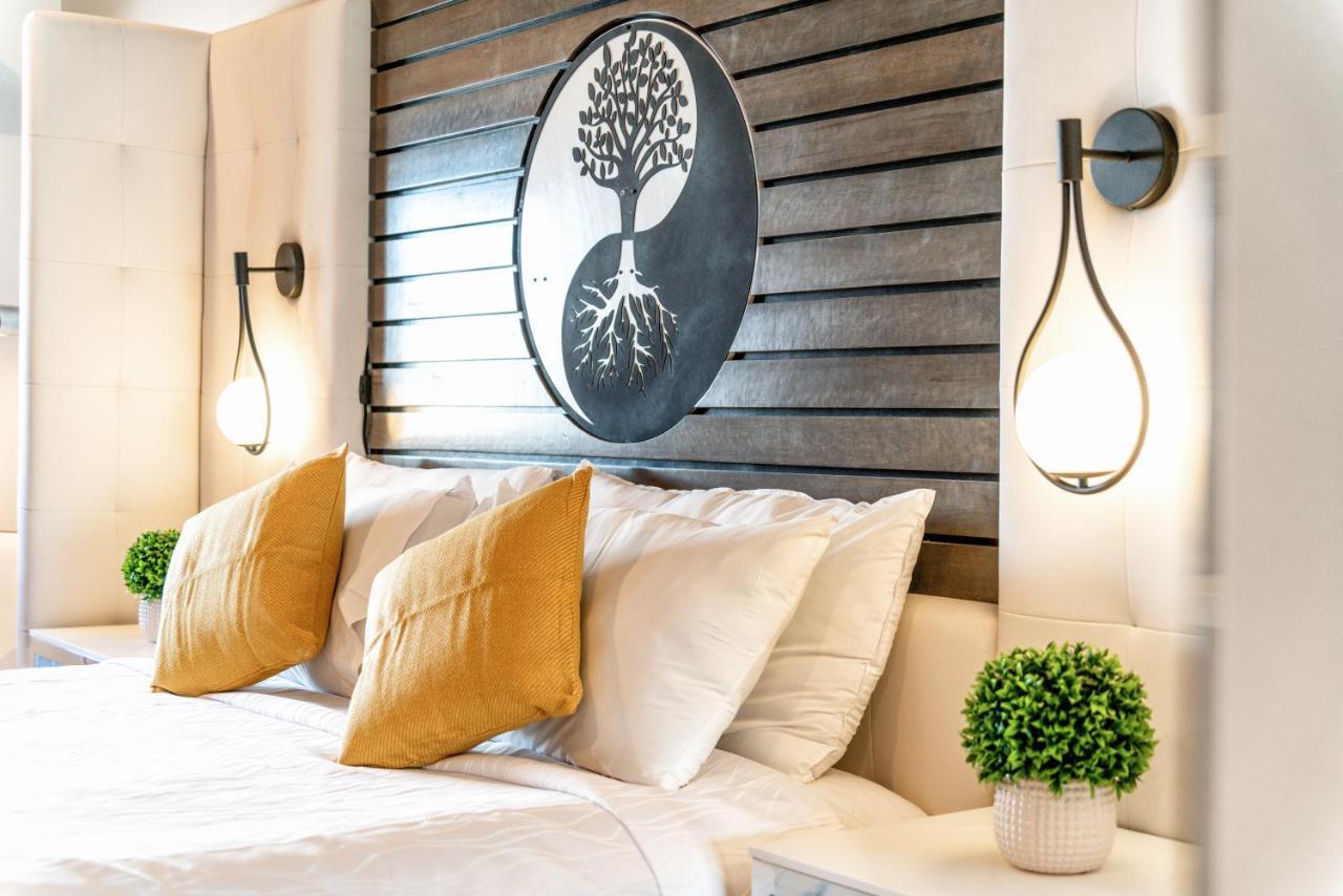 Aspire Inn Studios & Spas Беллфлавер Екстер'єр фото
