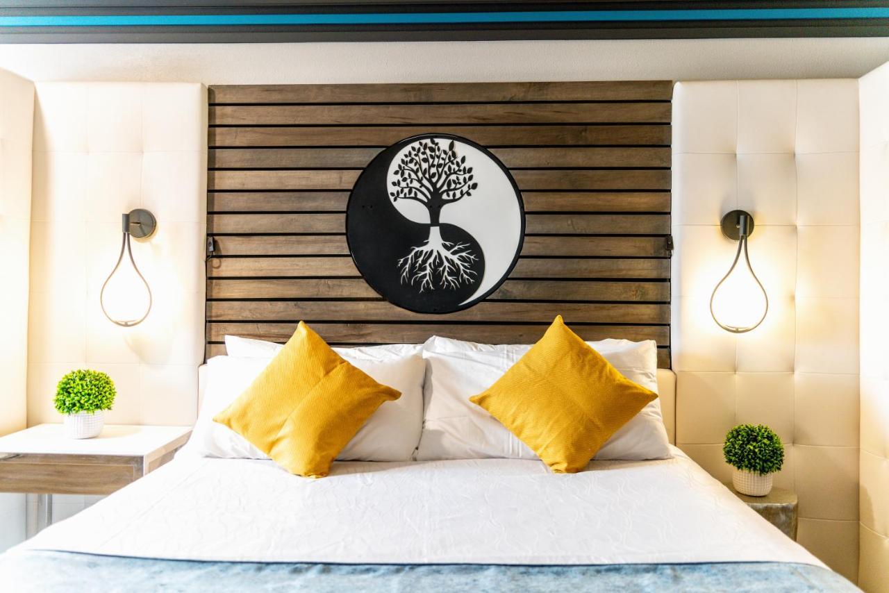 Aspire Inn Studios & Spas Беллфлавер Екстер'єр фото